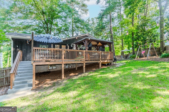 706 Powder Springs St SE, Smyrna, GA 30080 - back of property with board and batten siding, a wooden deck, and stairway