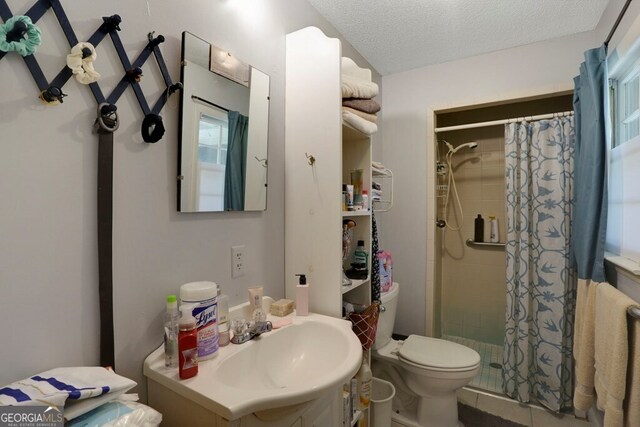 16 Lois Ln, Hayesville, NC 28904 - full bath featuring a stall shower, vanity, and a textured ceiling
