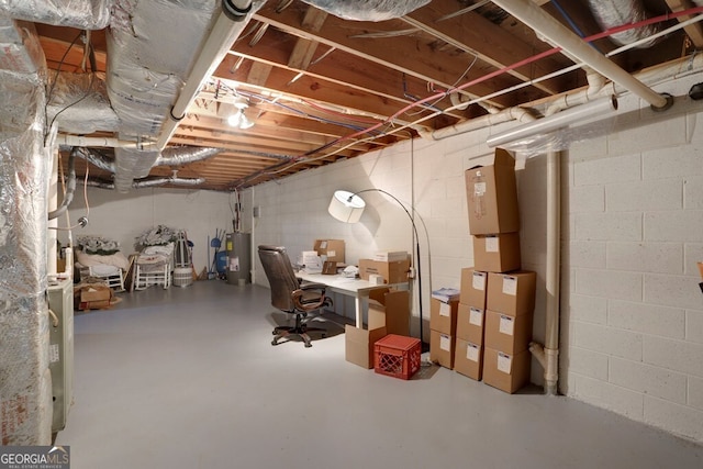 16 Lois Ln, Hayesville, NC 28904 - unfinished basement with electric water heater, an office area, and concrete block wall