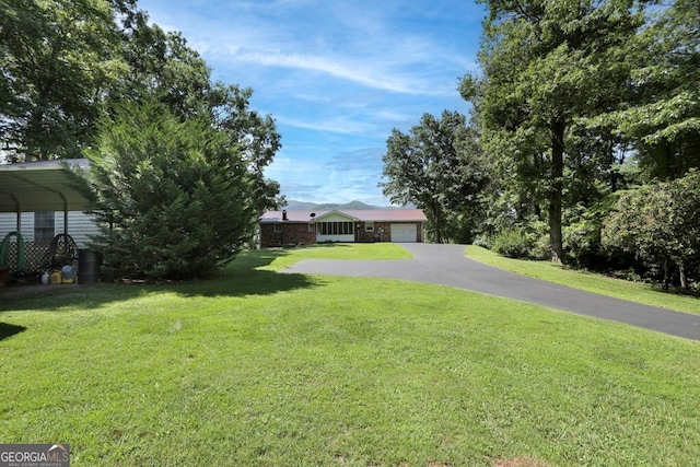 16 Lois Ln, Hayesville, NC 28904 - obstructed view of property with a front lawn and a garage