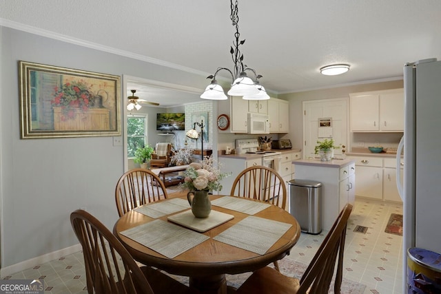 16 Lois Ln, Hayesville, NC 28904 - dining space with ornamental molding, ceiling fan, and a textured ceiling