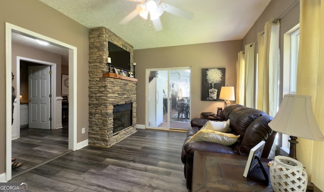 1780 Double Bridge Rd, Demorest, GA 30535 - living area featuring a ceiling fan, a fireplace, and wood finished floors