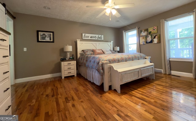 1780 Double Bridge Rd, Demorest, GA 30535 - bedroom with wood finished floors and a ceiling fan