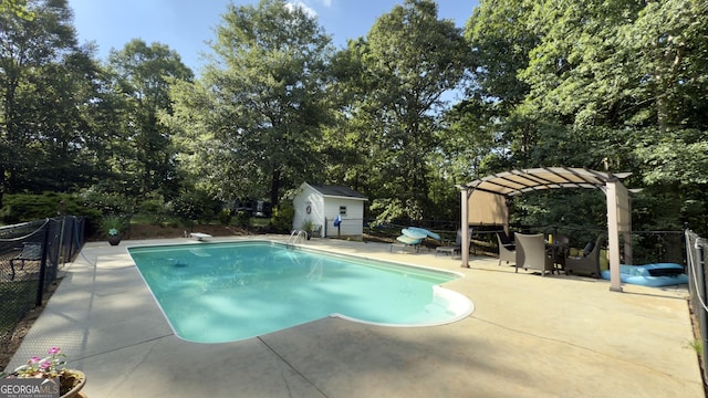 1780 Double Bridge Rd, Demorest, GA 30535 - view of swimming pool with a pergola, a patio area, a storage shed, view of scattered trees, and a diving board