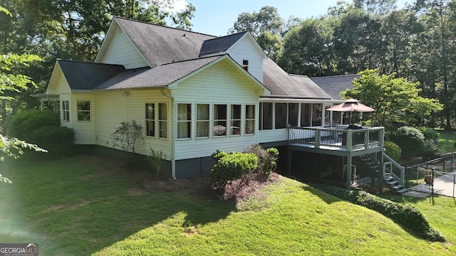 1780 Double Bridge Rd, Demorest, GA 30535 - back of house with a sunroom, a shingled roof, a deck, a lawn, and stairs