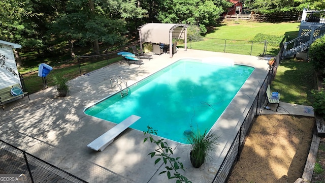 1780 Double Bridge Rd, Demorest, GA 30535 - view of swimming pool with a diving board, a patio, and view of wooded area