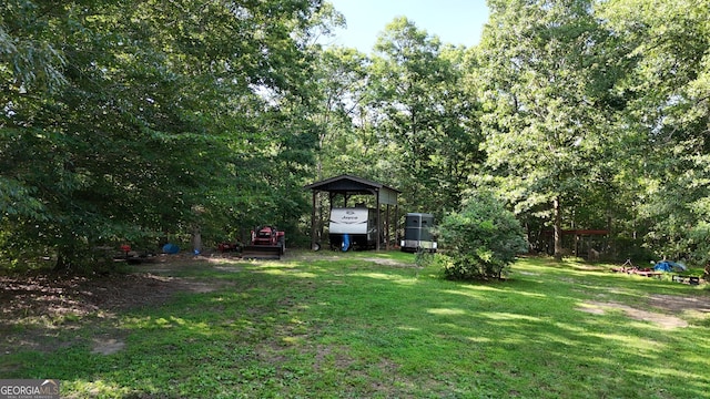 1780 Double Bridge Rd, Demorest, GA 30535 - view of green lawn featuring a carport