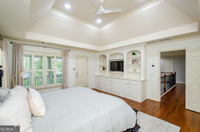 4645 Wykeshire Ct, Cumming, GA 30041 - bedroom with a raised ceiling, dark wood-type flooring, ornamental molding, recessed lighting, and a ceiling fan