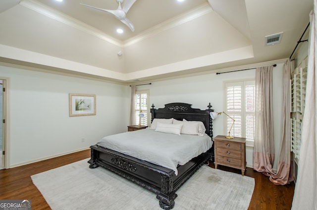 4645 Wykeshire Ct, Cumming, GA 30041 - bedroom featuring a tray ceiling, dark wood-style flooring, recessed lighting, crown molding, and a ceiling fan