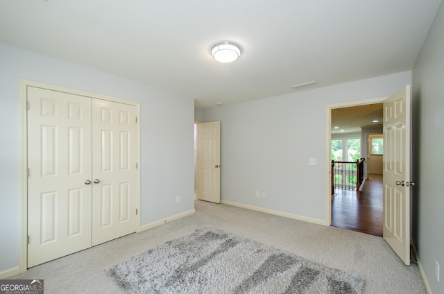 4645 Wykeshire Ct, Cumming, GA 30041 - unfurnished bedroom with carpet and a closet