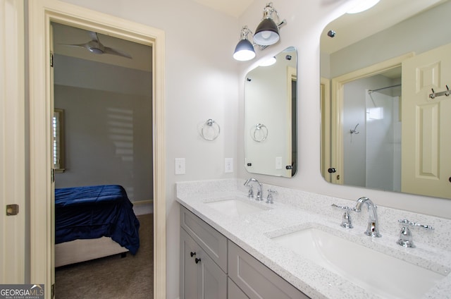 4645 Wykeshire Ct, Cumming, GA 30041 - ensuite bathroom featuring double vanity and ceiling fan