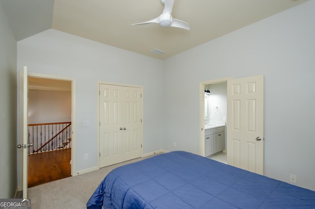 4645 Wykeshire Ct, Cumming, GA 30041 - bedroom with light colored carpet, a ceiling fan, and connected bathroom