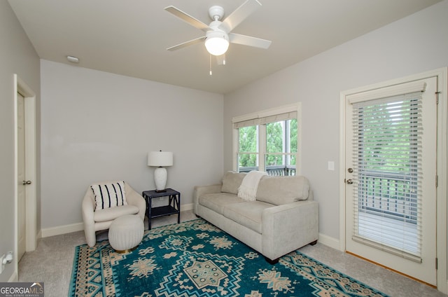 4645 Wykeshire Ct, Cumming, GA 30041 - carpeted living room featuring a ceiling fan and baseboards