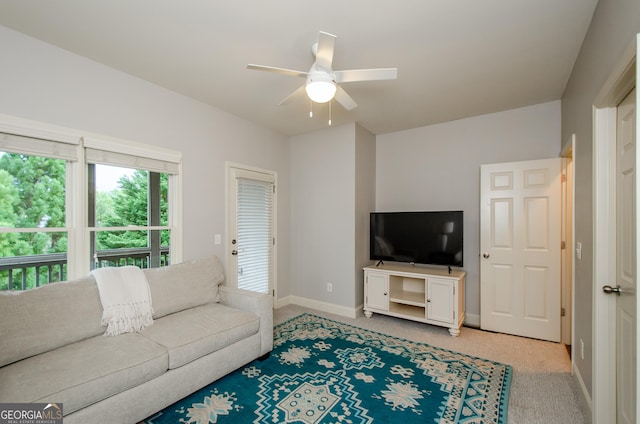 4645 Wykeshire Ct, Cumming, GA 30041 - living area featuring a ceiling fan and light carpet