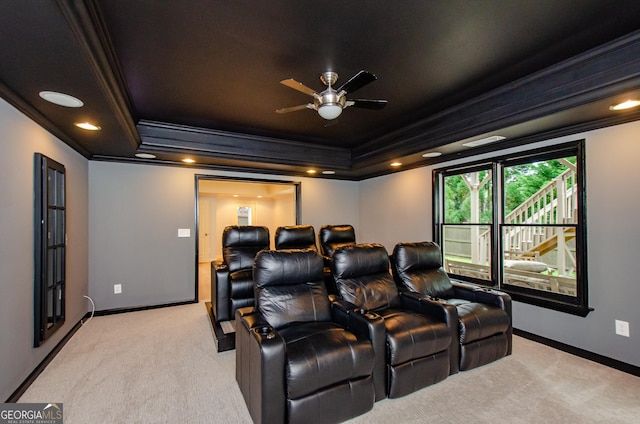 4645 Wykeshire Ct, Cumming, GA 30041 - home theater room featuring ornamental molding, a raised ceiling, light carpet, a ceiling fan, and recessed lighting