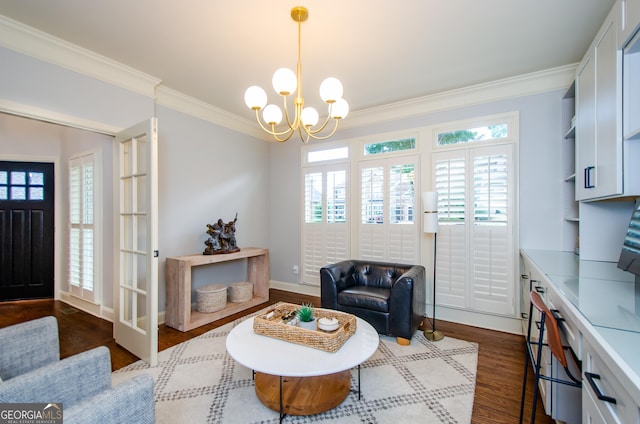 4645 Wykeshire Ct, Cumming, GA 30041 - living area featuring crown molding, a chandelier, plenty of natural light, dark wood finished floors, and french doors