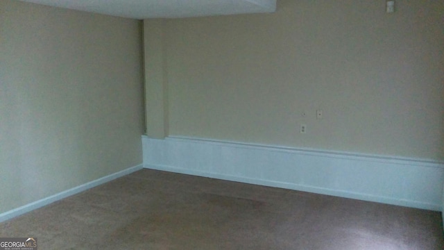 2297 Horseshoe Bend Rd SW, Marietta, GA 30064 - empty room featuring dark carpet and baseboards