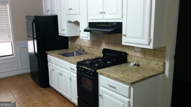 2297 Horseshoe Bend Rd SW, Marietta, GA 30064 - kitchen featuring black appliances, under cabinet range hood, white cabinetry, decorative backsplash, and light tile patterned floors