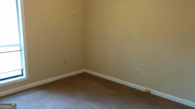 2297 Horseshoe Bend Rd SW, Marietta, GA 30064 - carpeted empty room featuring baseboards