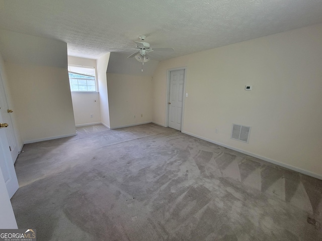 424 Ivey Edwards Ln, Mcdonough, GA 30253 - unfurnished room featuring a ceiling fan, carpet, and a textured ceiling