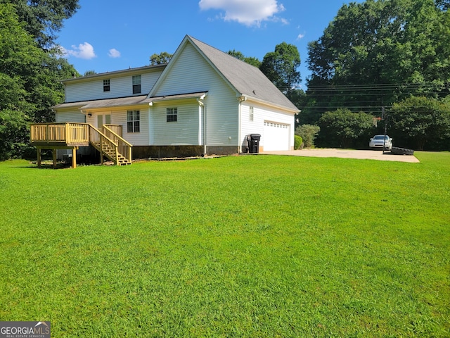 424 Ivey Edwards Ln, Mcdonough, GA 30253 - back of property featuring a wooden deck, a lawn, driveway, stairs, and crawl space
