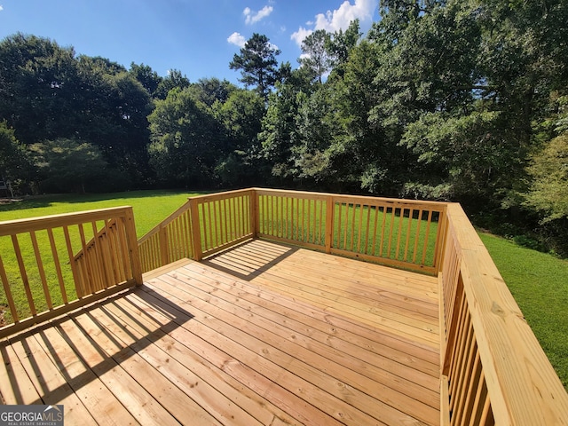 424 Ivey Edwards Ln, Mcdonough, GA 30253 - deck with a lawn and view of wooded area