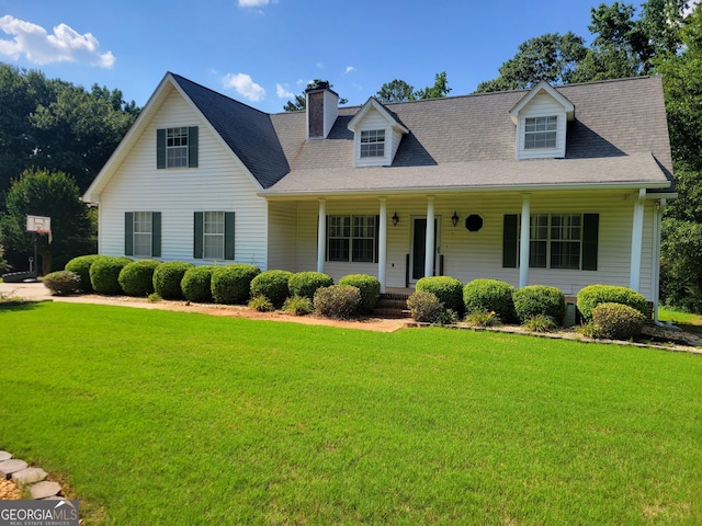 424 Ivey Edwards Ln, Mcdonough, GA 30253 - new england style home featuring a front yard, a porch, a chimney, and a shingled roof