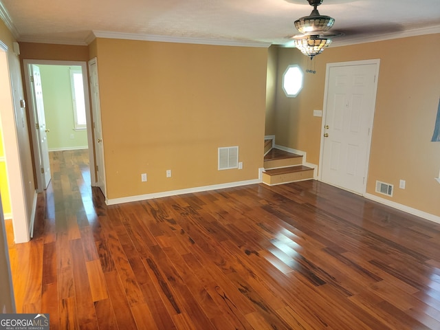 424 Ivey Edwards Ln, Mcdonough, GA 30253 - unfurnished living room with hardwood / wood-style floors and ornamental molding