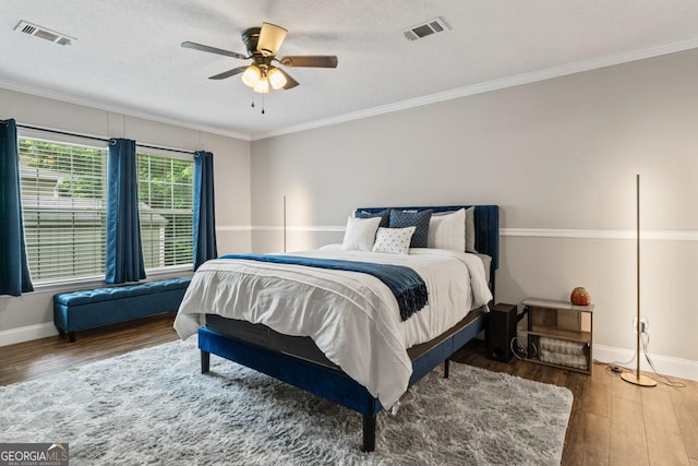 41 Bob White Ln, Newnan, GA 30263 - bedroom featuring wood finished floors, crown molding, and ceiling fan