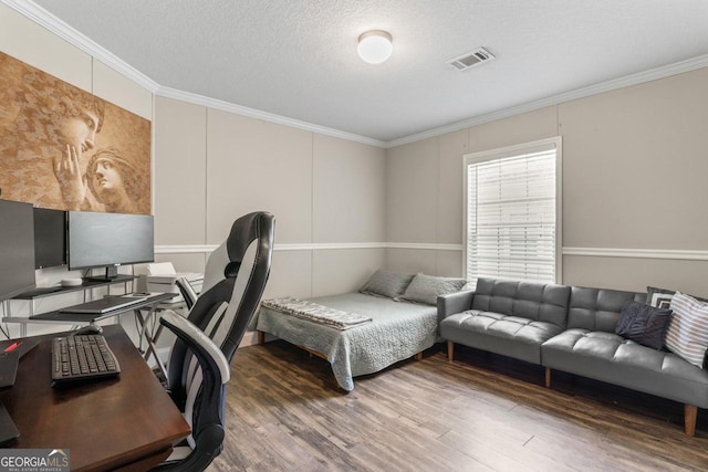 41 Bob White Ln, Newnan, GA 30263 - bedroom with wood finished floors, an office area, crown molding, and a textured ceiling