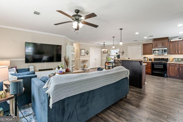 41 Bob White Ln, Newnan, GA 30263 - living area with ceiling fan, crown molding, dark wood finished floors, and recessed lighting