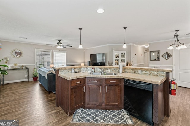 41 Bob White Ln, Newnan, GA 30263 - kitchen featuring dishwasher, crown molding, dark brown cabinetry, open floor plan, and pendant lighting