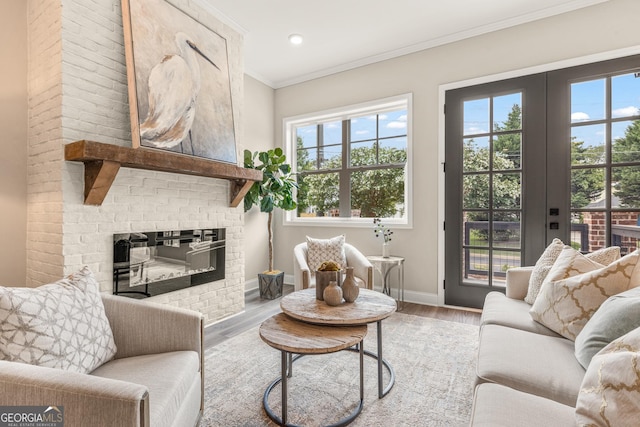 947 Willingham Dr Unit 2, Hapeville, GA 30354 - living area with a fireplace, ornamental molding, wood finished floors, and recessed lighting