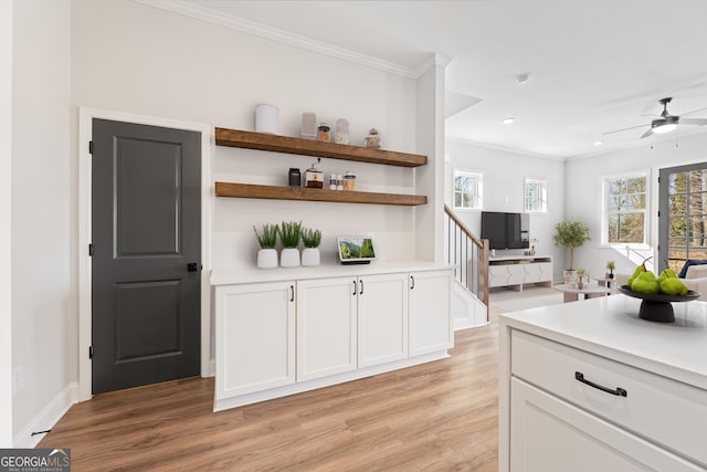 945 Willingham Dr Unit 3, Hapeville, GA 30354 - bar featuring ornamental molding, light wood-type flooring, ceiling fan, and recessed lighting