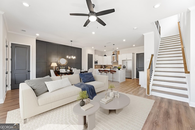 945 Willingham Dr Unit 3, Hapeville, GA 30354 - living area featuring crown molding, stairs, light wood-type flooring, ceiling fan, and recessed lighting