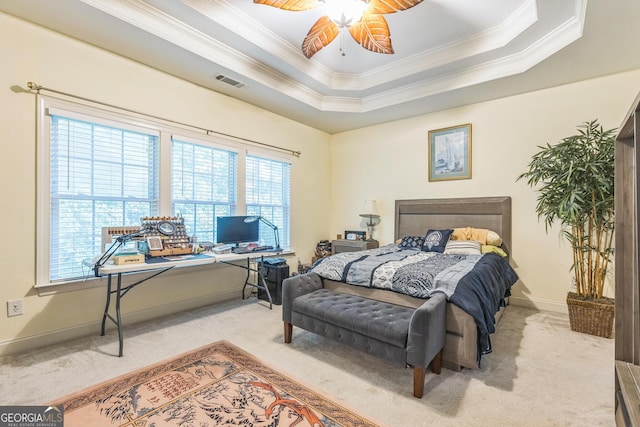 7769 Copper Kettle Way, Flowery Branch, GA 30542 - bedroom with light carpet, crown molding, an office area, a raised ceiling, and a ceiling fan