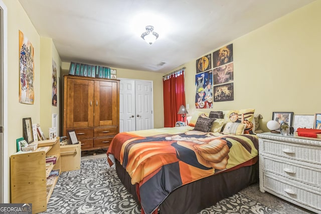 7769 Copper Kettle Way, Flowery Branch, GA 30542 - carpeted bedroom featuring a closet
