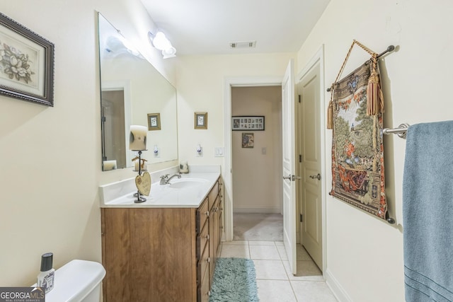 7769 Copper Kettle Way, Flowery Branch, GA 30542 - bathroom featuring vanity and tile patterned floors