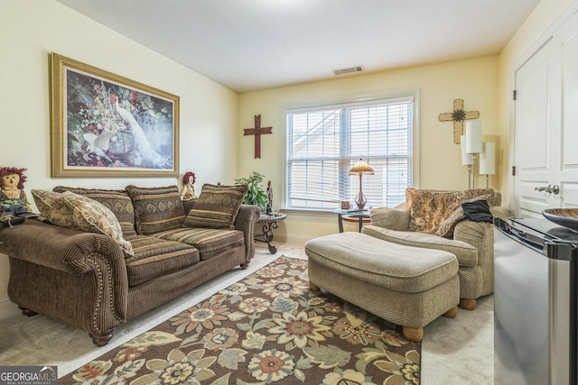 7769 Copper Kettle Way, Flowery Branch, GA 30542 - carpeted living room with baseboards