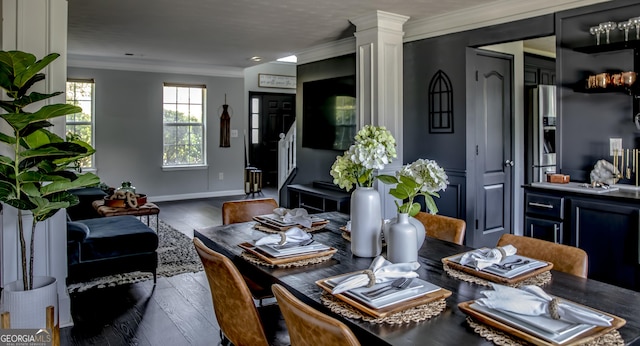 184 Fashion Xing, Mcdonough, GA 30252 - dining area with crown molding, wood finished floors, and ornate columns