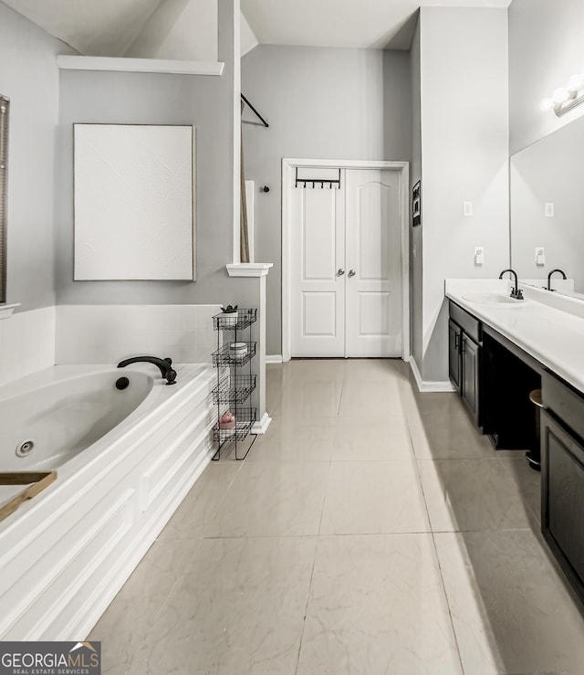 184 Fashion Xing, Mcdonough, GA 30252 - bathroom with vanity and a whirlpool tub