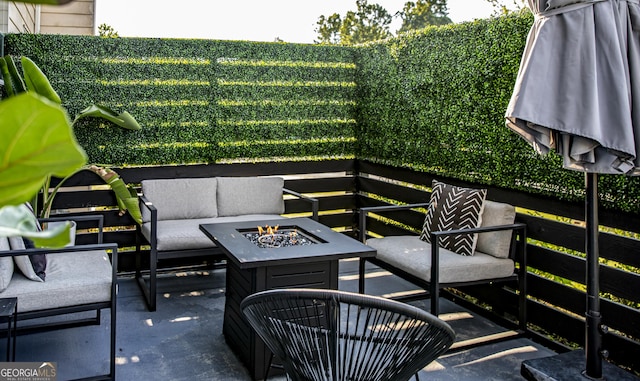 184 Fashion Xing, Mcdonough, GA 30252 - view of patio / terrace featuring an outdoor living space with a fire pit