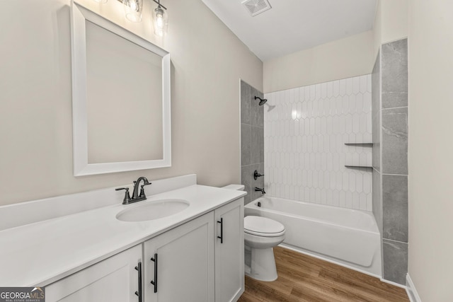 937 Willingham Dr Unit 7, Hapeville, GA 30354 - bathroom with vanity, wood finished floors, and shower / bathtub combination