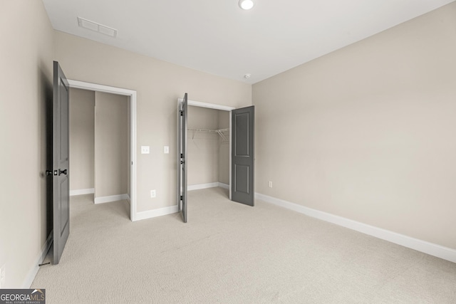 937 Willingham Dr Unit 7, Hapeville, GA 30354 - unfurnished bedroom with light colored carpet, a closet, recessed lighting, and a spacious closet