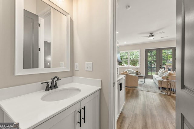 937 Willingham Dr Unit 7, Hapeville, GA 30354 - bathroom with wood finished floors, vanity, french doors, and ceiling fan