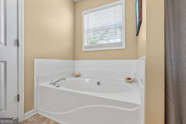 603 Rossie Ct, Mcdonough, GA 30252 - bathroom with a garden tub