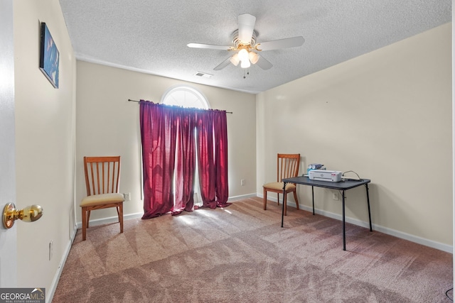 603 Rossie Ct, Mcdonough, GA 30252 - living area with a textured ceiling, ceiling fan, and carpet floors