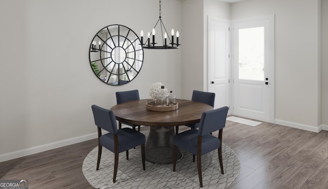 927 Willingham Dr Unit 12, Hapeville, GA 30354 - dining space featuring wood finished floors and a chandelier
