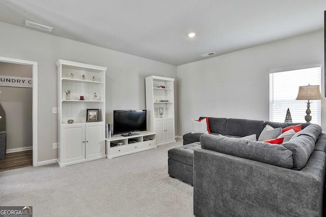17 October Ave, Newnan, GA 30265 - living area featuring light colored carpet and baseboards