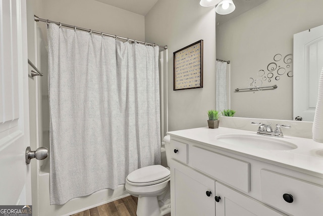 17 October Ave, Newnan, GA 30265 - bathroom with vanity, wood finished floors, and shower / tub combo